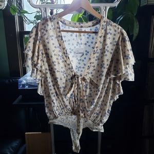 Free People deep v-neck with ties bodysuit